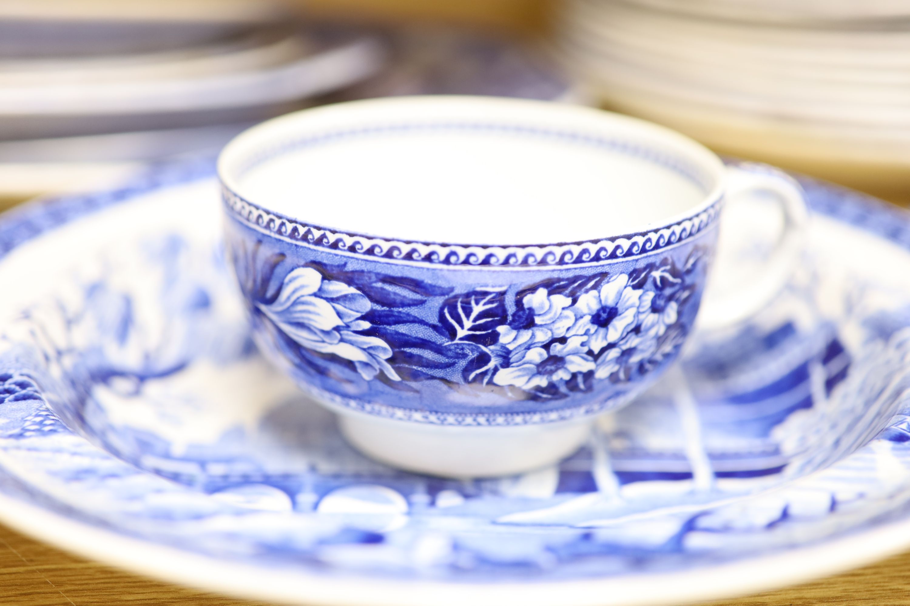 A quantity of 19th century blue and white pottery, including a Harewood House platter, 37cm, and a Spode Rome Tiber soup plate